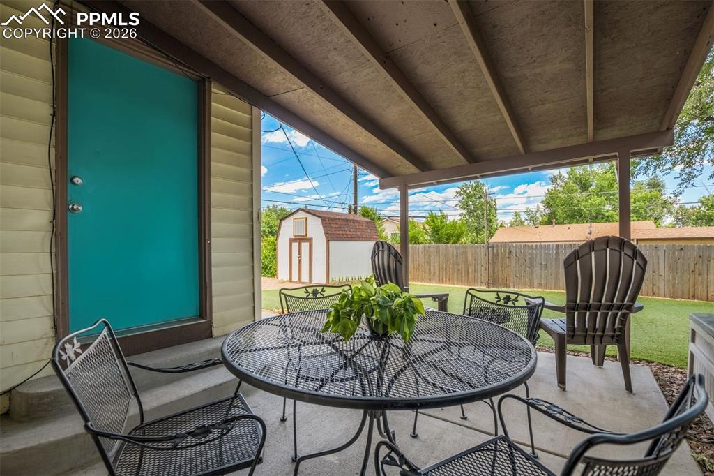 Image 38 of 44: Fenced backyard