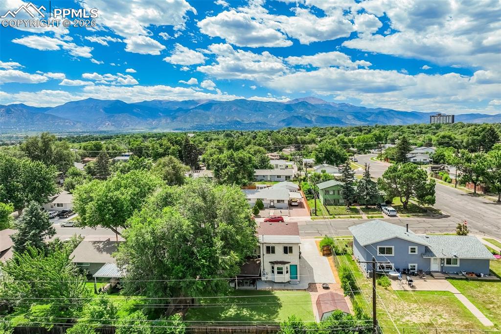 Image 44 of 44: Aerial view with mountain backdrop