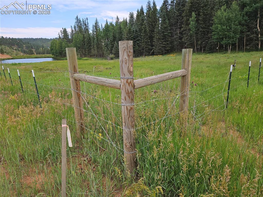 Image 1 of 47: Corner of Fenced Portion of Land