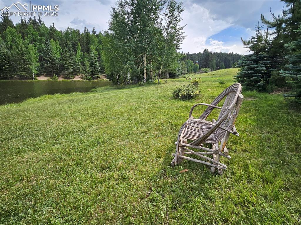 Image 38 of 47: Bench Overlooking Community Property