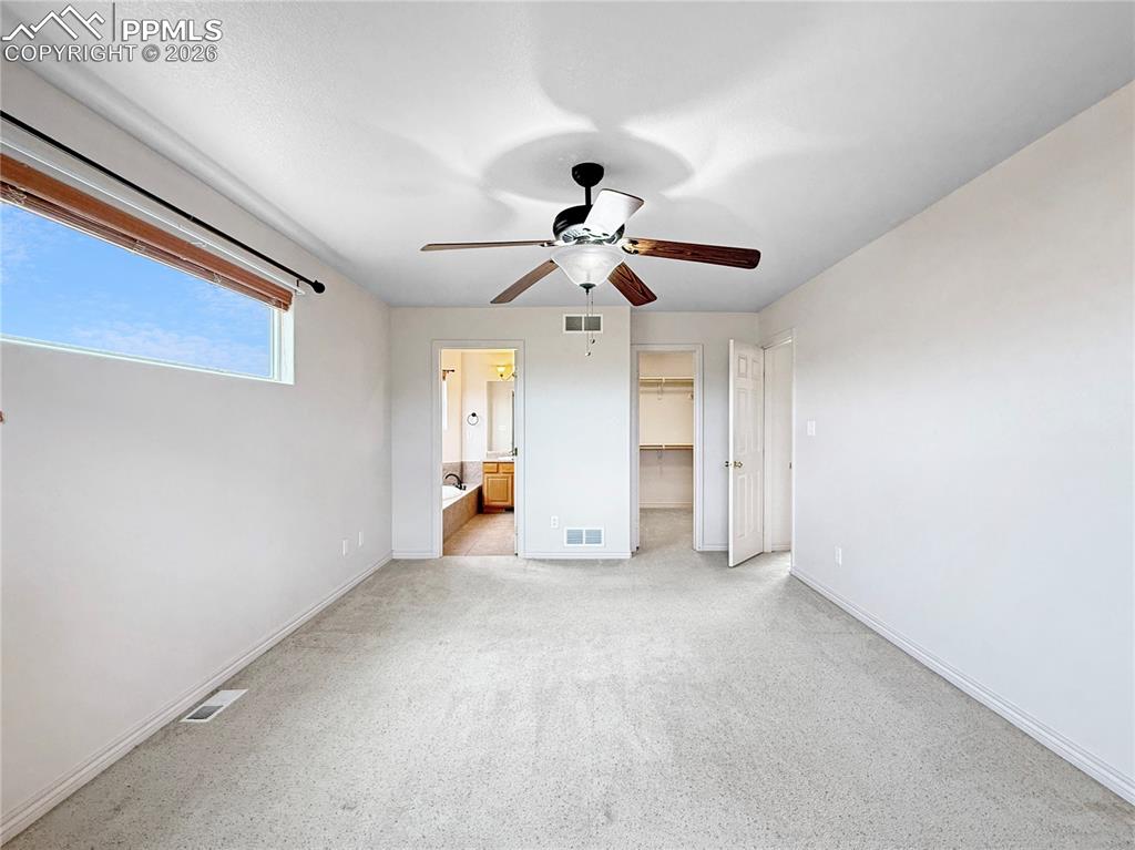 Image 13 of 39: Primary Bedroom