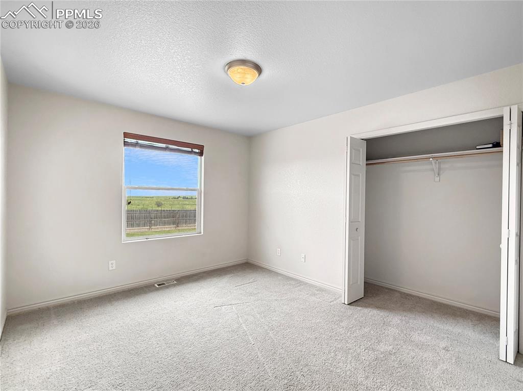 Image 24 of 39: Bedroom