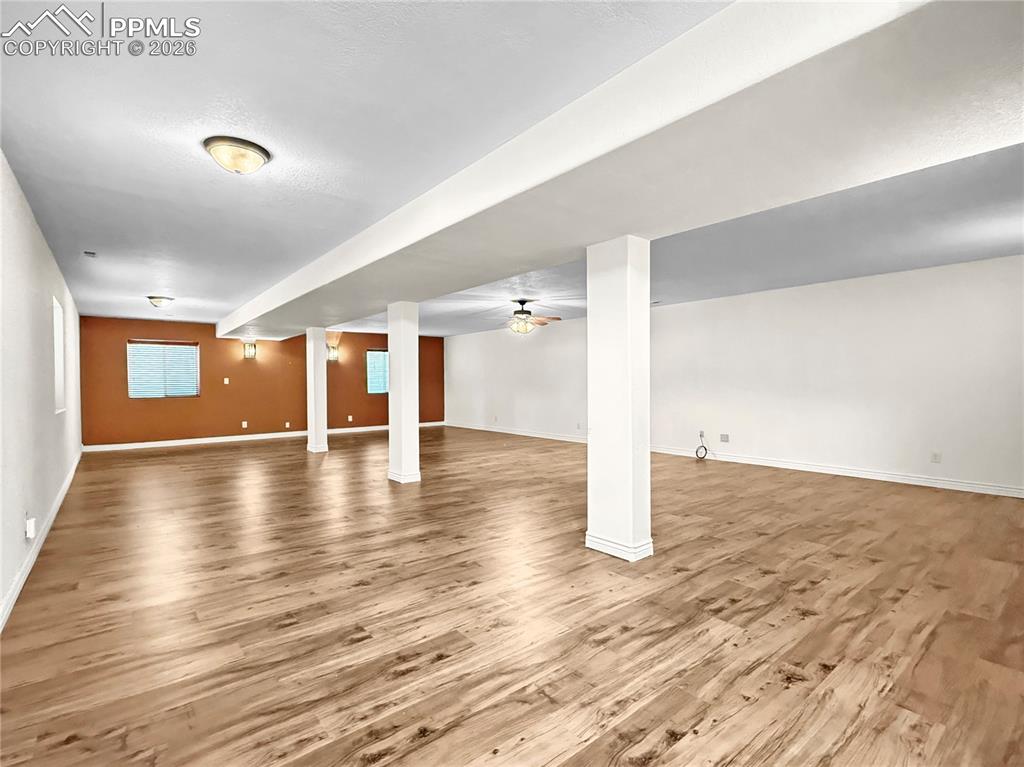 Image 27 of 39: Spacious finished basement. Stubbed in for 3rd bath