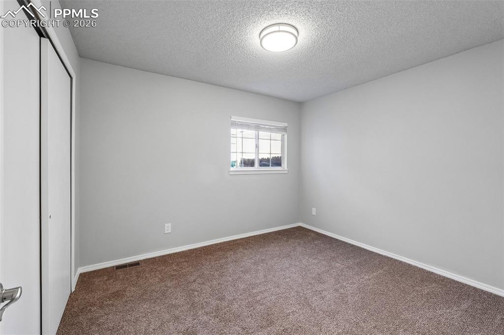Image 7 of 28: Bedroom