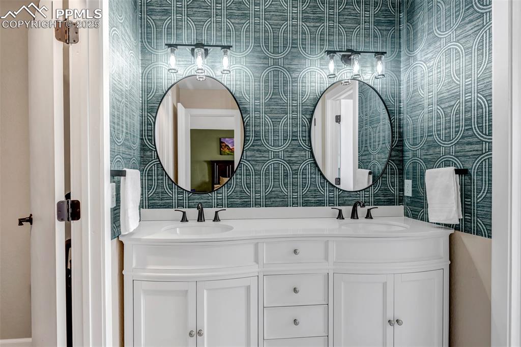 Image 26 of 46: Bathroom with double vanity