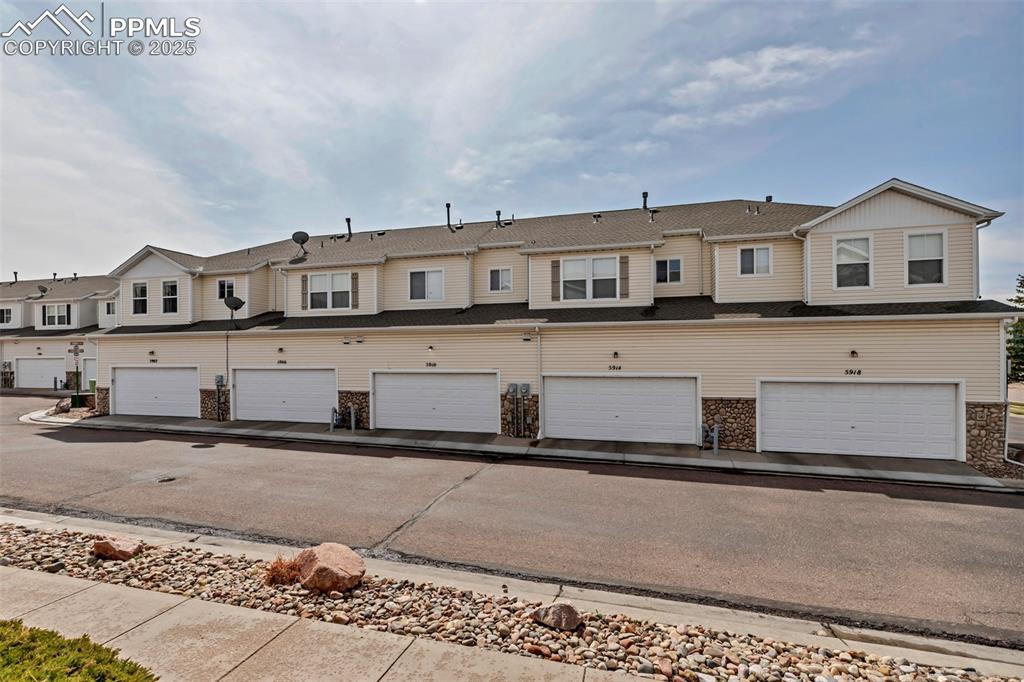 Image 4 of 46: View of property featuring a residential view
