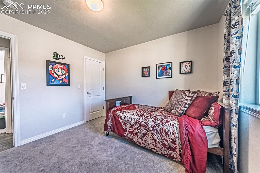 Image 18 of 38: Bedroom