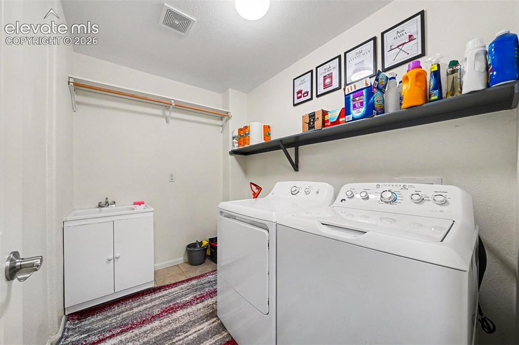 Image 22 of 26: Basement Laundry
