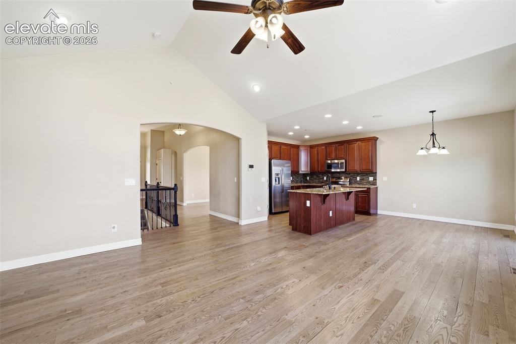 Image 13 of 50: Great Room adjoins the kitchen and breakfast nook