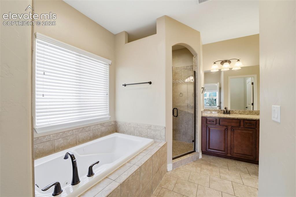Image 16 of 50: Luxurious Primary Bathroom