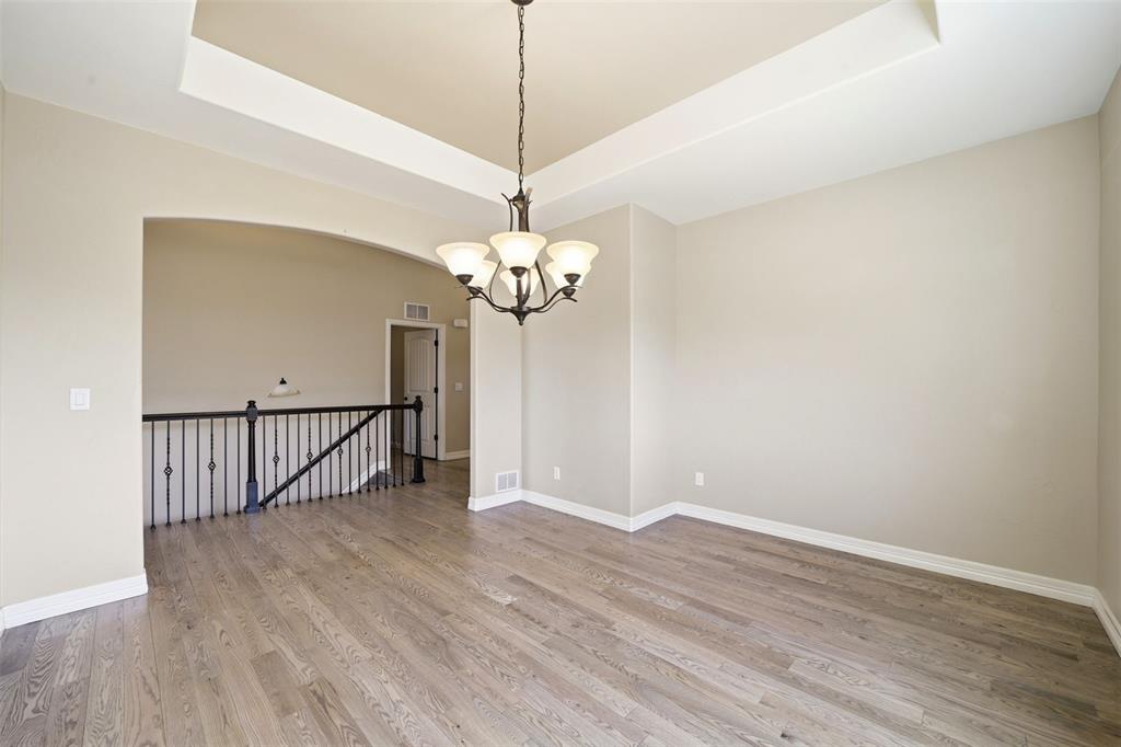 Image 5 of 50: Main level dining room or home office