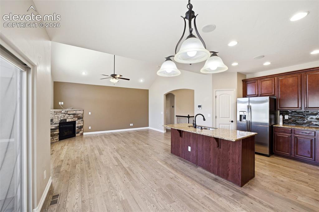 Image 9 of 50: Breakfast nook overlooking the deck and backyard