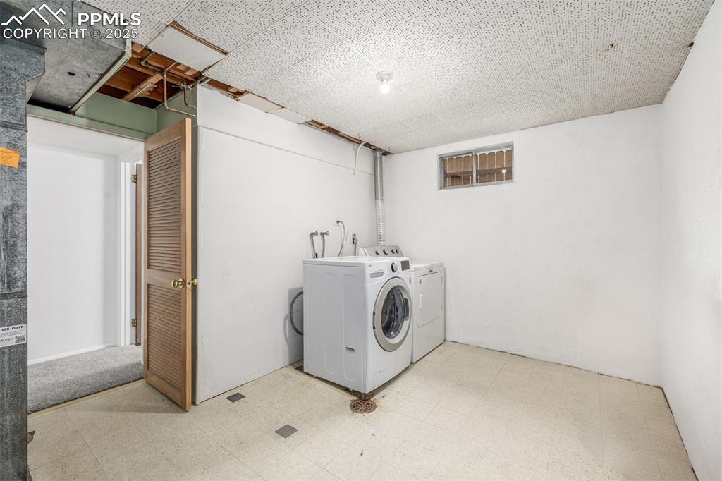 Image 19 of 36: Laundry area and mechanical room leave lots of extra space for even more st