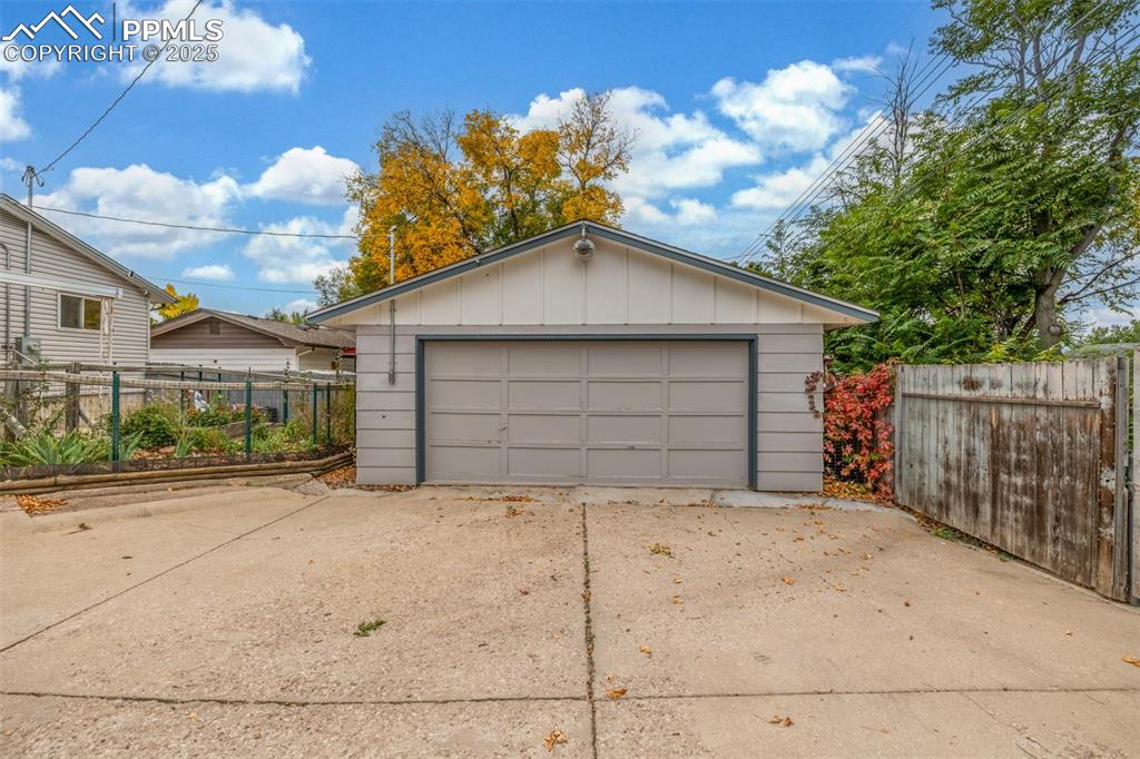 Image 22 of 36: BONUS oversized 2-car garage is all yours