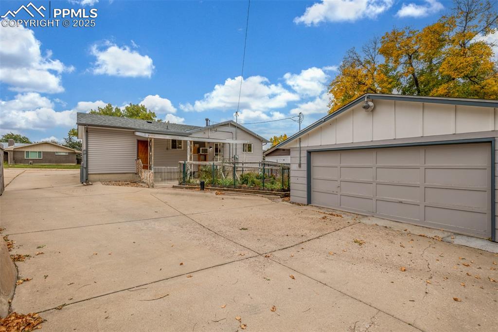 Image 3 of 36: BONUS 2-car detached garage with private, gated driveway.