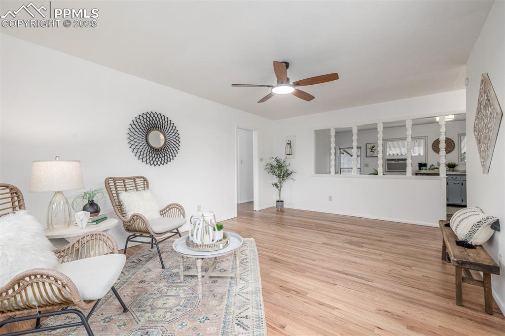 Image 5 of 36: Living area opens into the eat-in kitchen