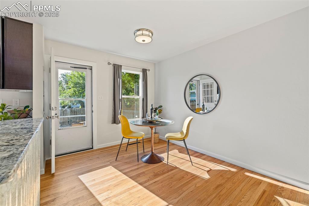Image 10 of 39: Dining area with light wood-type flooring