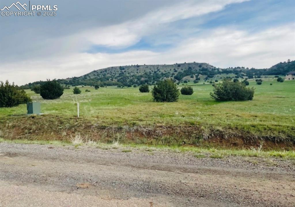 Image 4 of 4: Mountain view with rural landscape