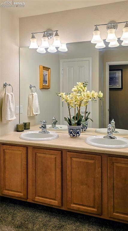 Image 24 of 37: Bathroom featuring double vanity