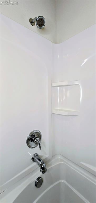 Image 25 of 37: Bathroom view of tub / shower combination