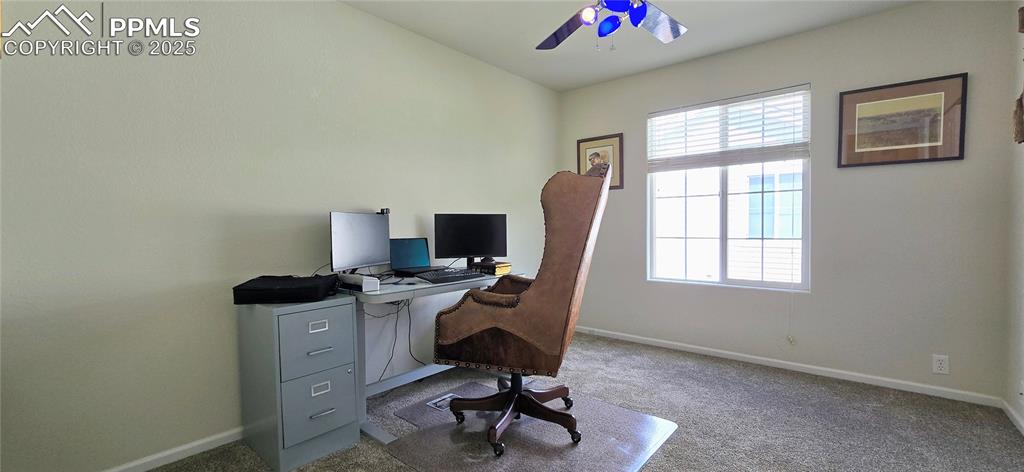 Image 32 of 37: Carpeted home office featuring baseboards and ceiling fan