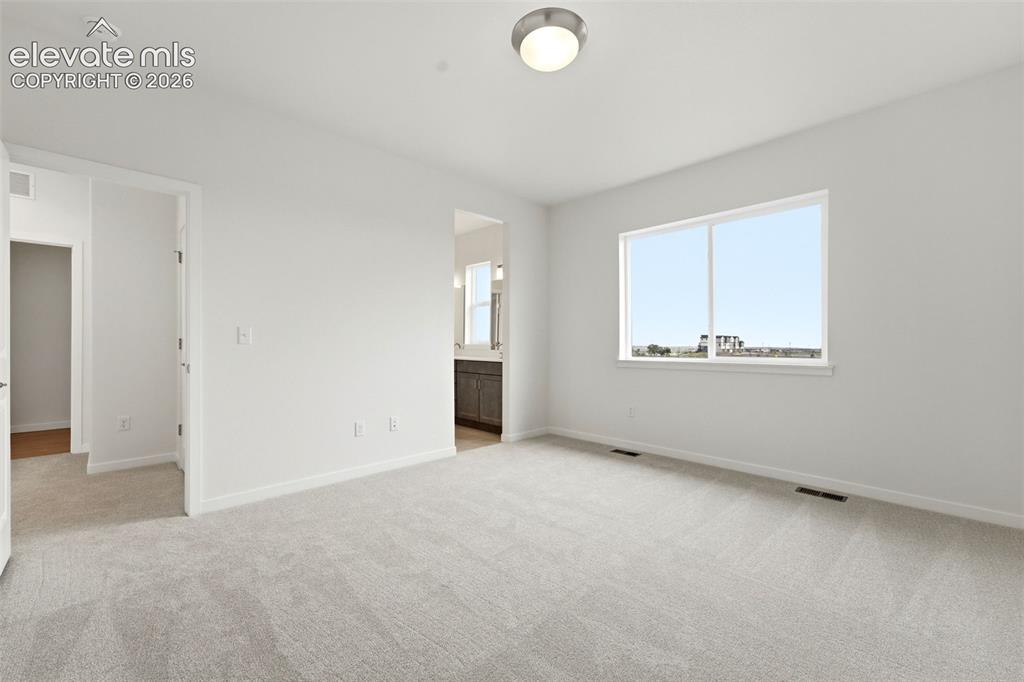 Image 13 of 29: Master Bedroom