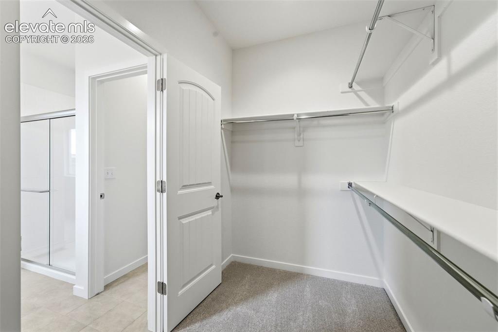 Image 15 of 29: Primary Closet
