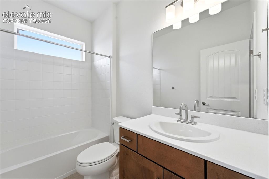 Image 19 of 29: Upstairs Bath 1