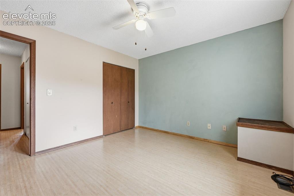 Image 21 of 27: Master Bedroom