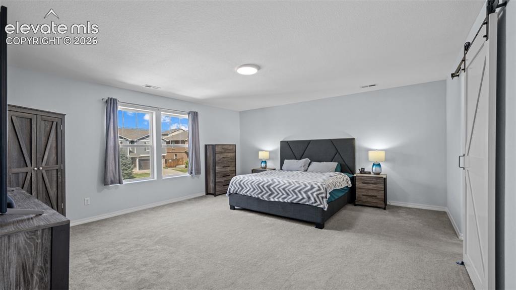 Image 24 of 40: Master Bedroom