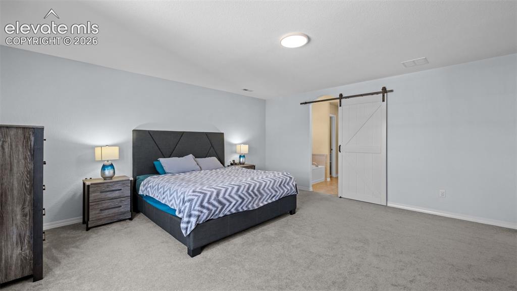 Image 25 of 40: Master Bedroom