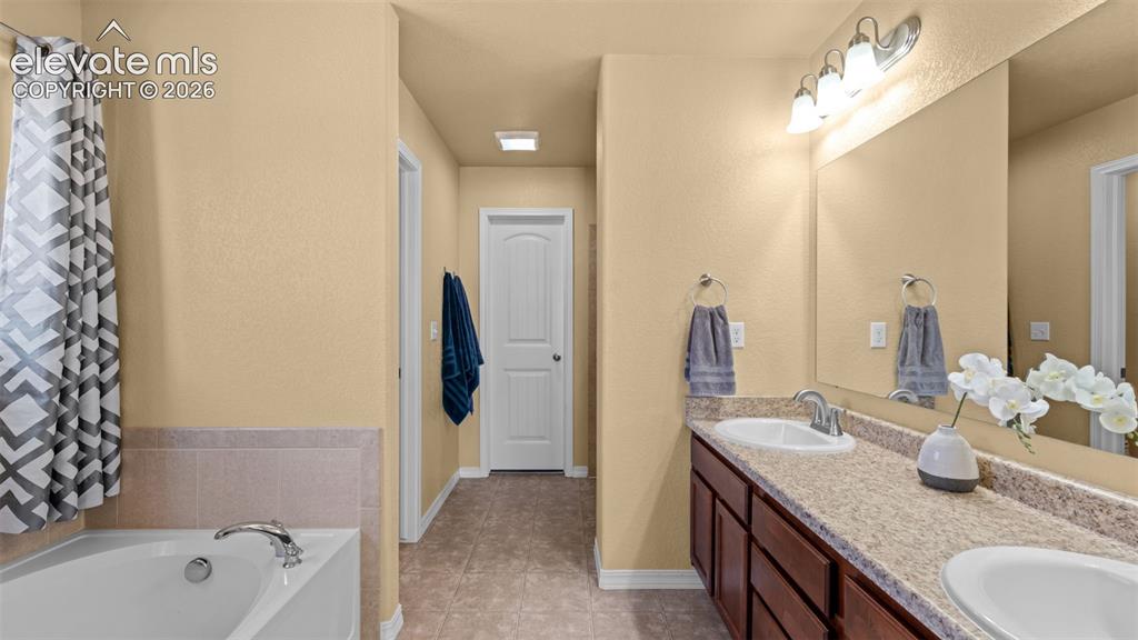 Image 26 of 40: Master Bathroom
