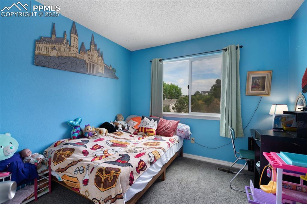 Image 27 of 43: Bedroom