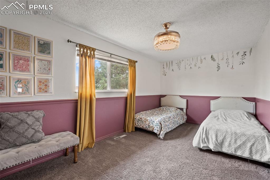 Image 28 of 40: Bedroom