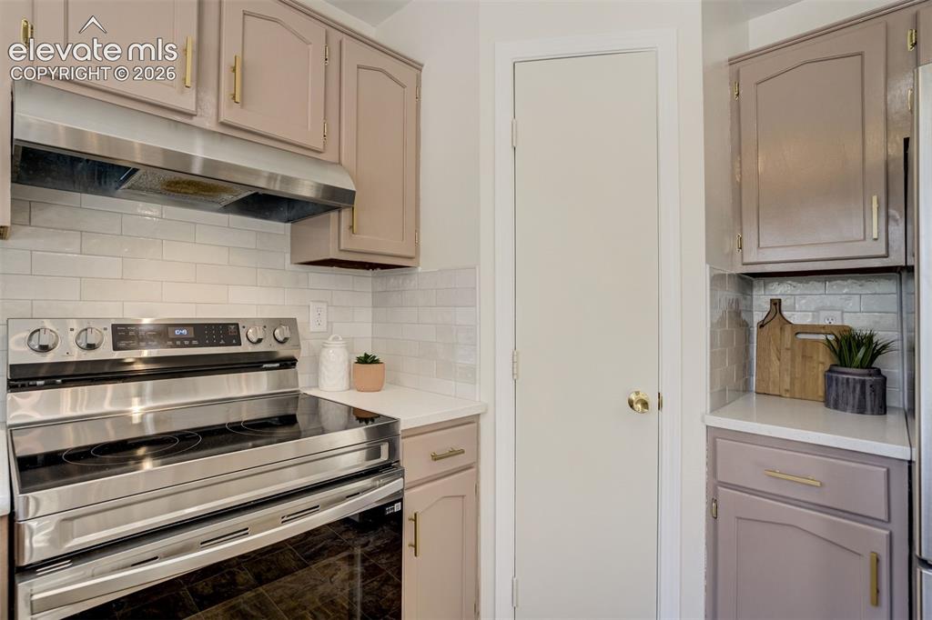 Image 12 of 39: Corner pantry for all the snacks.