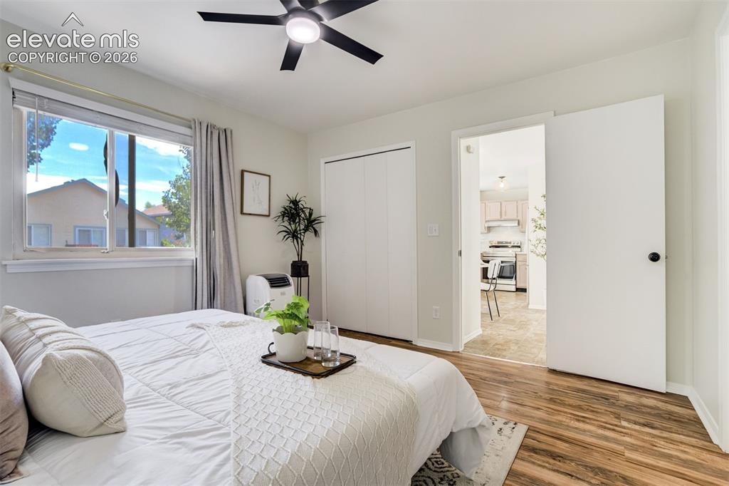 Image 19 of 39: Ceiling fan and no carpet. 