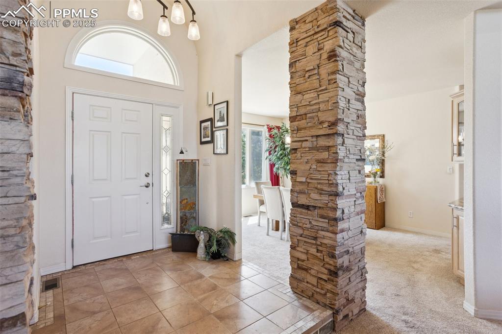 Image 6 of 49: Handsome Stone Pillars in the Entry!