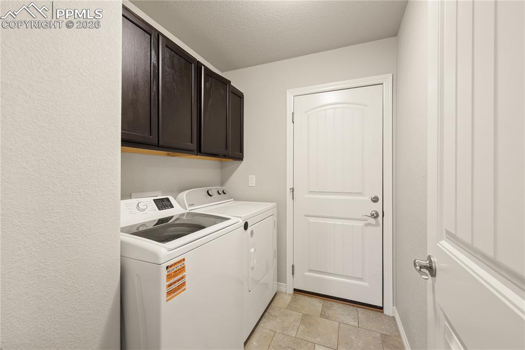 Image 17 of 39: Laundry to Garage door