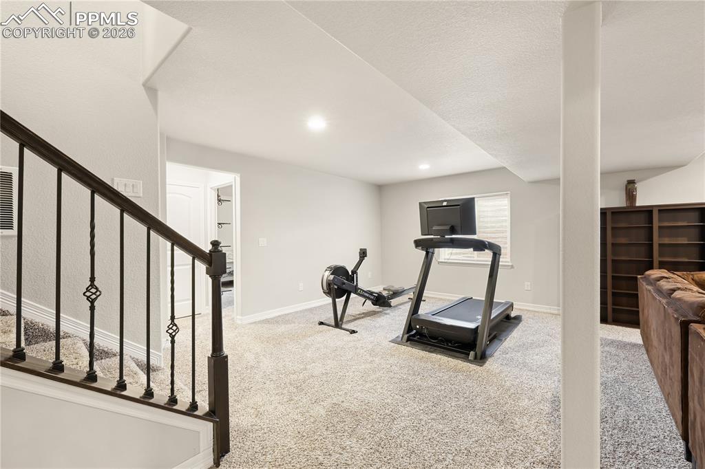 Image 23 of 39: Downstairs to Basement