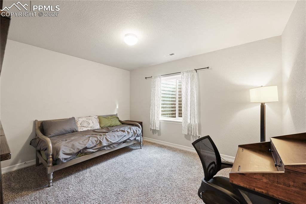 Image 28 of 39: Basement Bedroom 4