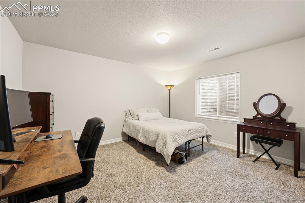Image 29 of 39: Basement Bedroom 5 