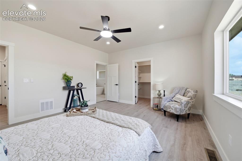 Image 13 of 26: Primary bedroom suite
