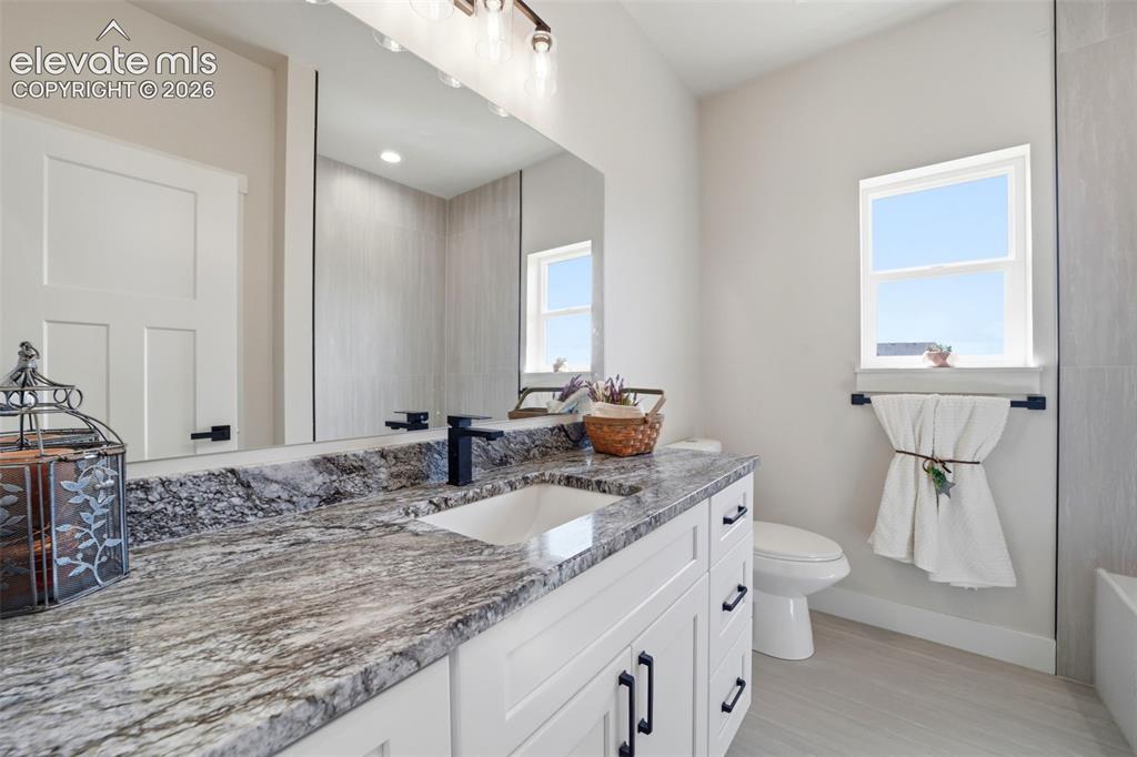 Image 21 of 26: Full Bathroom, hall bath