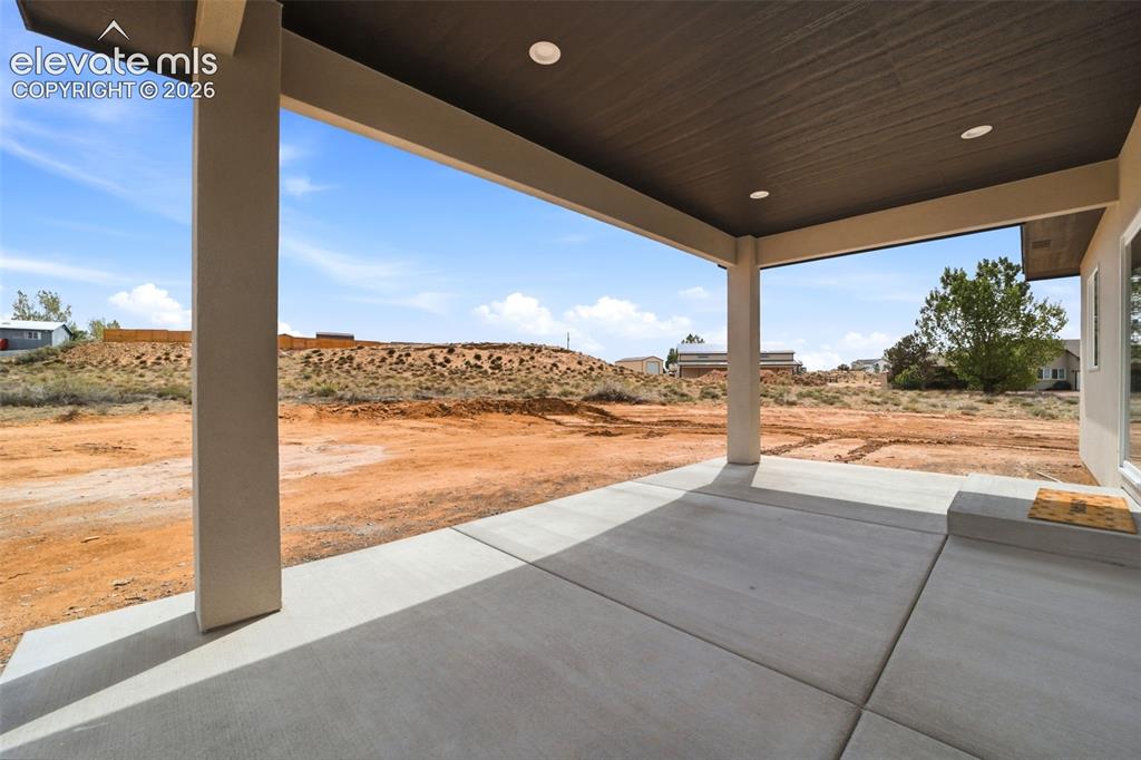Image 25 of 26: Large covered patio