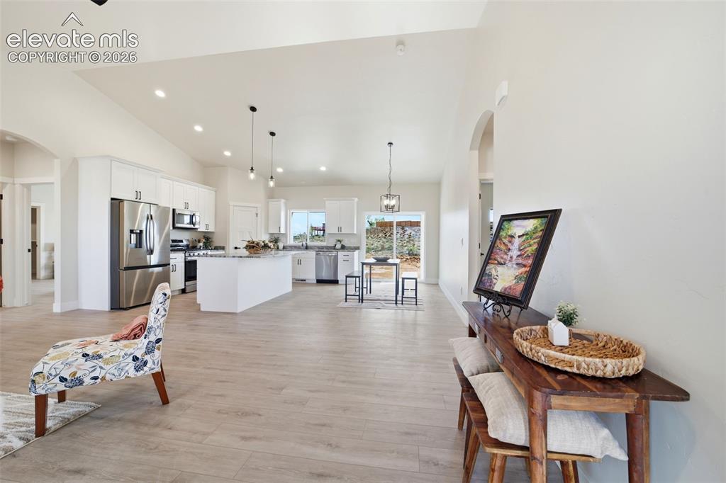 Image 4 of 26: Entry to open concept