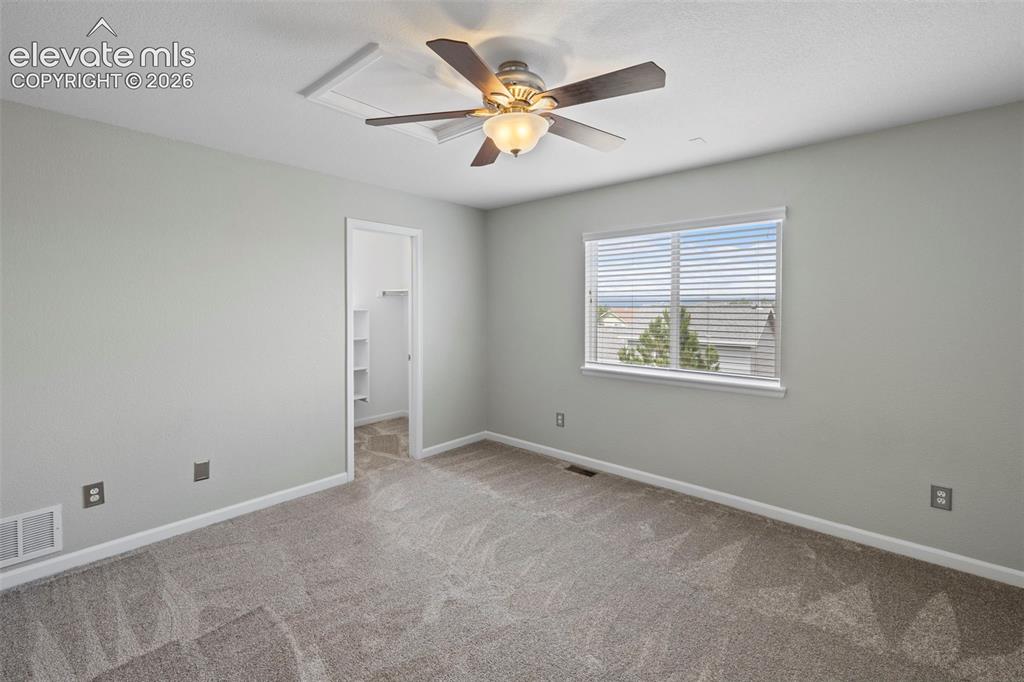 Image 21 of 50: Bedroom on the 2- level with walk-in closet and brand new carpet