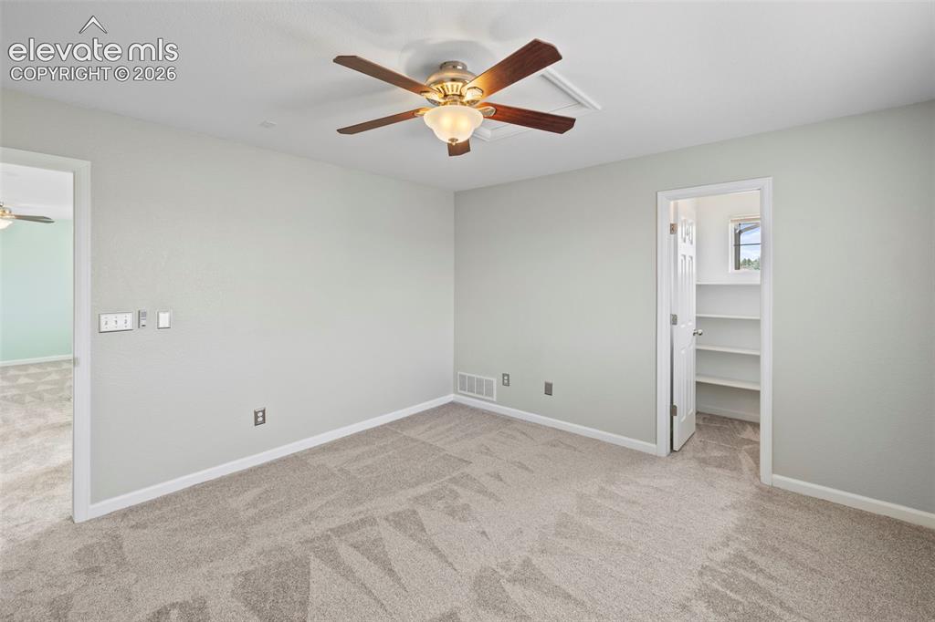Image 22 of 50: Bedroom on the 2- level with walk-in closet and brand new carpet