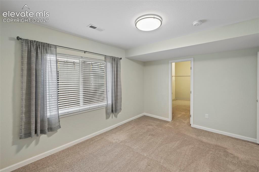 Image 31 of 50: Additional basement bedroom with huge walk-in closet