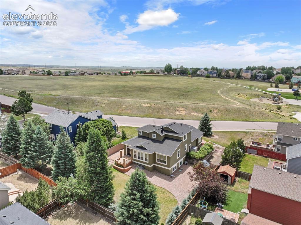 Image 45 of 50: Ideally located next to open space with trails and park