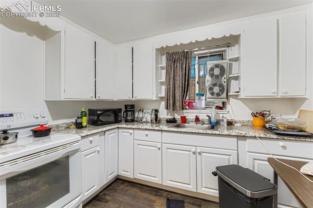 Image 9 of 49: Kitchen - Living Room, 2 Bedrooms, Bathroom, Living Room, Kitchen - Could b
